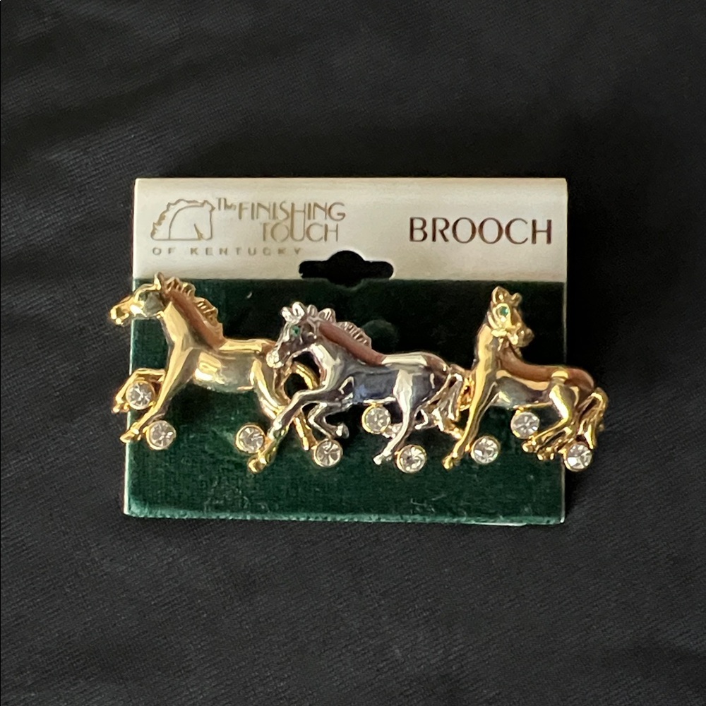 NWT. 3 Running Horses Brooch with very sparkly rhinestone accents.